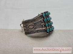 Native American ~ Turquoise & Sterling Silver. Snake Eyes Cuff Bracelet. Matches examples found for 4 Row, Petit Point, Zuni. Safety chain appears to be a replacement. MB