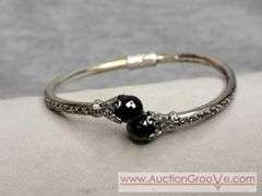 SARDA Sterling Silver Black Onyx Hinged Bangle Bracelet. Onyx has a few chips. 13.4g. JB