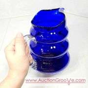 Vintage Louie Glass Co. Cobalt Blue Glass Harpo Pitcher and Tumbler 1930's. Wavy Cobalt Blue Pitcher and Five Glasses. 8 x 9.