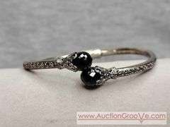 SARDA Sterling Silver Black Onyx Hinged Bangle Bracelet. Onyx has a few chips. 13.4g. JB