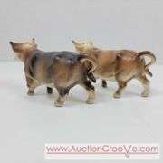 Victoria Ceramics Cow Salt and Pepper Shakers and Kirk Pewter. Both cow sets have one damaged horn each. See photos. A