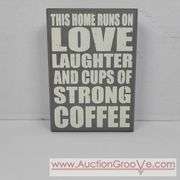 This home Runs on love laughter and cups of strong coffee. 5 x 7. Sign. T2