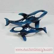 2 Ceramic Whale Figuines. 7 x 3 and 5 x 2. A