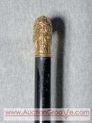 Golden Handle Cane inscribed, "Presented to E. Stanley Employee of National Bag Co. 33". A2