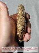 Golden Handle Cane inscribed, "Presented to E. Stanley Employee of National Bag Co. 33". A2