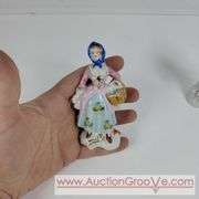 Colonial figurines made in Japan. 4" tall. A