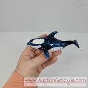 2 Ceramic Whale Figuines. 7 x 3 and 5 x 2. A
