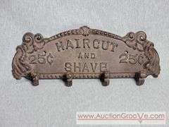 Cast Iron Coat Hanger. Haircut and Shave 25 Cents. 13 x 5. A3
