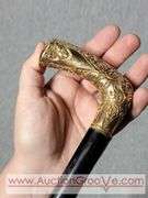 Golden Handle Cane inscribed, "Presented to E. Stanley Employee of National Bag Co. 33". A2
