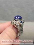 SARDA Sterling Silver Ring. Artisan Gem Collection of Bali. .30CTW Ocal Cabochon and Trillion Tanzanite. Size 9. 12g. JB