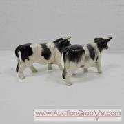 Victoria Ceramics Cow Salt and Pepper Shakers and Kirk Pewter. Both cow sets have one damaged horn each. See photos. A