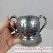 Reed and Barton Silver Soldered coffee, Plymouth salt and pepper Shakers and cream and sugar on a bent tray. A