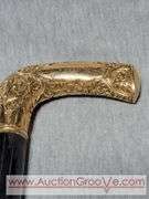 Golden Handle Cane inscribed, "Presented to E. Stanley Employee of National Bag Co. 33". A2