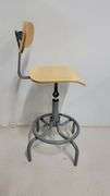 You are bidding on a Single, Swivel, Contoured Plywood, Adjustable Height Stools Chair by INTERION.  More available in this auction. Used and fully functional. See photos for details.  From Company in