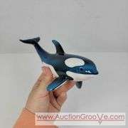 2 Ceramic Whale Figuines. 7 x 3 and 5 x 2. A