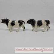 Victoria Ceramics Cow Salt and Pepper Shakers and Kirk Pewter. Both cow sets have one damaged horn each. See photos. A