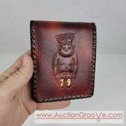 Two Vintage Hand Tooled Leather Wallets. A