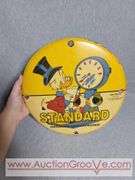 Standard Gasoline. Unsurpassed Walt Disney. Round Metal Sign. 12". B1