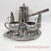 Reed and Barton Silver Soldered coffee, Plymouth salt and pepper Shakers and cream and sugar on a bent tray. A