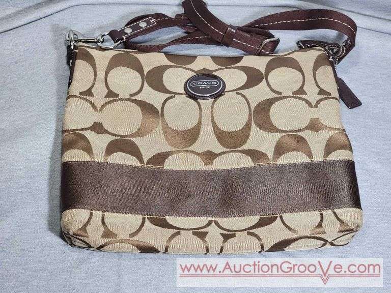 Coach Cross Body Sling Bag / Purse. It appears to be authentic but inspect the photos and decide for yourself. B