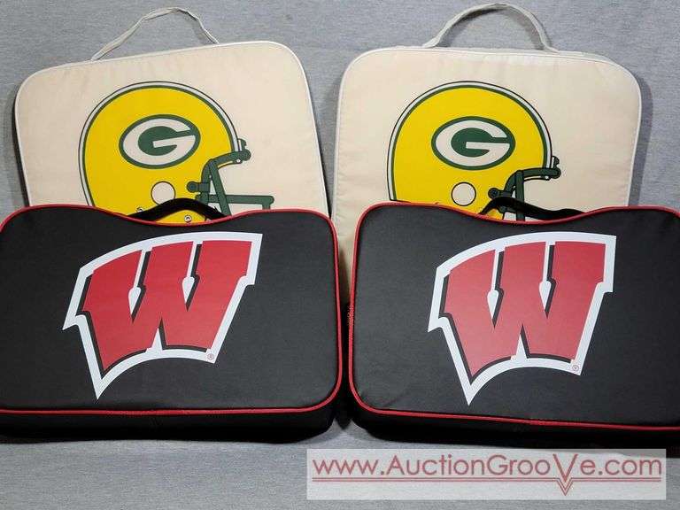 4 Bleacher Cushions. 2 new with Tags. Two used Packers cushions. B