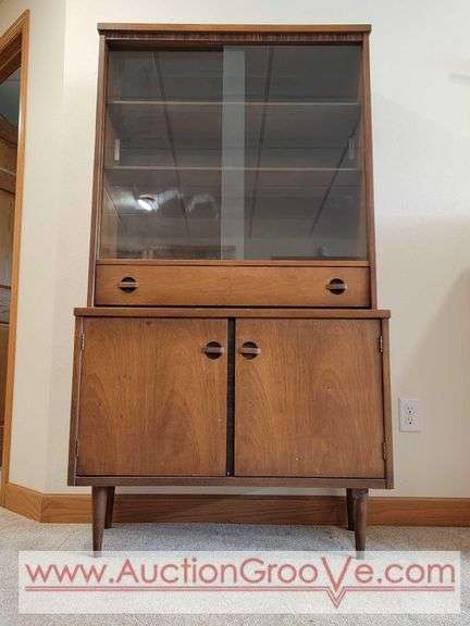 Style House Exclusive MCM Hutch. One Piece with Removable Glass. 36 x 16 x 65. *Must Bring Adequate Help to Remove. Located in Lower Level. BLR