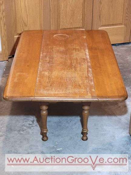 Drop Leaf Coffee Table. Nice Table just Needs a Little TLC 48 x 16 x 16. Or 48 x 30 x 16. * Must Bring Adequate Help to Remove. Located in Lower Level. Bb
