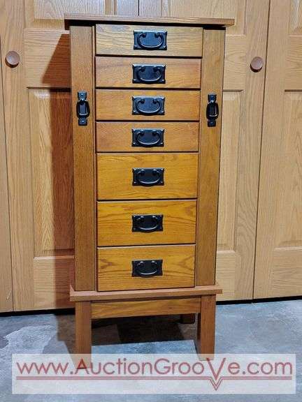 Jewelry Cabinet. Has some tape residue on mirror. 18 x 13 x 40.5. *Must Bring Adequate Help to Remove..Located in Lower Level. Bb