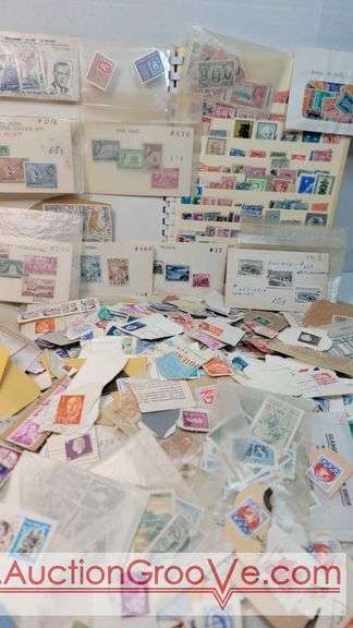 Worldwide Stamps including a Master Stock Book with 11 full pages of ...