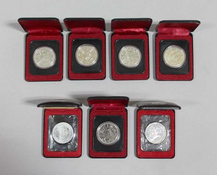 CANADIAN SILVER DOLLAR COLLECTION (7)