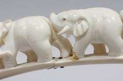 CARVED IVORY TUSK BRIDGE
