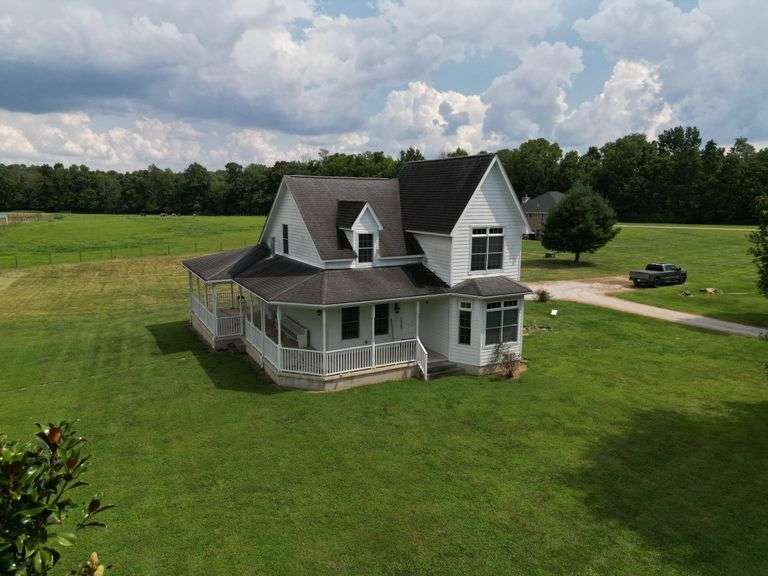 3 BR 2.5 BA Home on 1.8 Acres w/Full Basement & Wrap Around Porch