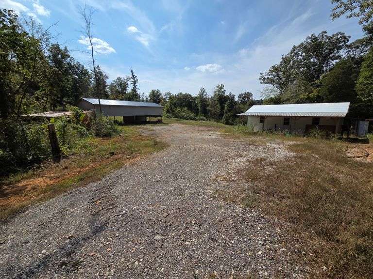 82 Acres - Cabin & Barns - Mostly Wooded - Fields & Creek