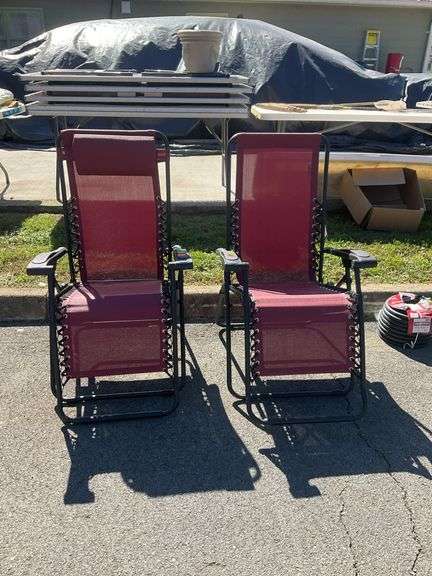 Pair of zero gravity chaise lounge chairs, just one headrest cushion, otherwise both items are like new