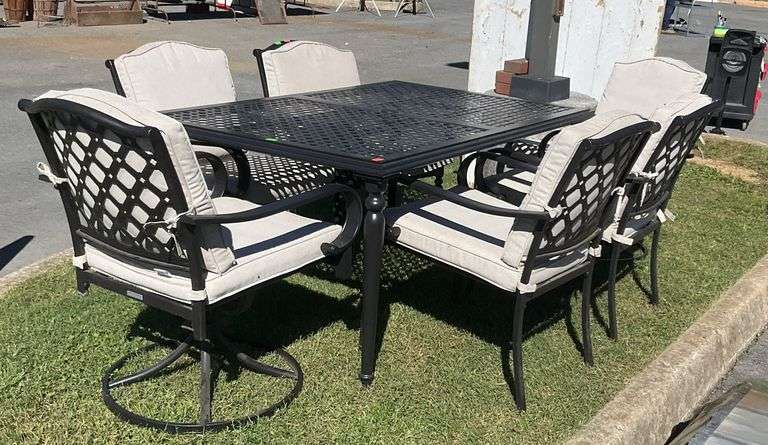Hampton Bay 7pc patio set, pair of swivel captain chairs, four stationary arm chairs, all with back/bottom cushions, metal table 62”L x 40”W, slightly used in like new condition, worth keeping and eye on