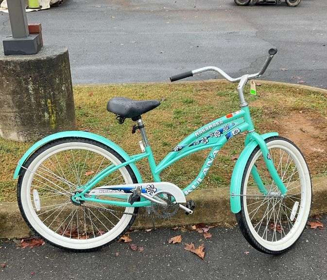 Kulana beach cruiser, Makamaka ed., white wall tires, wide rubber grip handlebars, wide bottom seat, teal color with floral accents, well maintained bike,ready to ride condition
