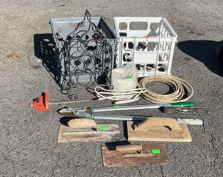 2-poly crates with coated wire, loopers, finishing trowels, level, wine bottle holder
