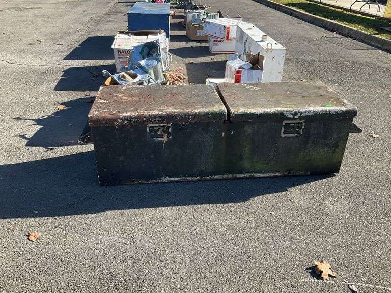 Truck bed toolbox, 62”L x 21”W x 17”deep, rust holes, and arms arms hold up doors are broken