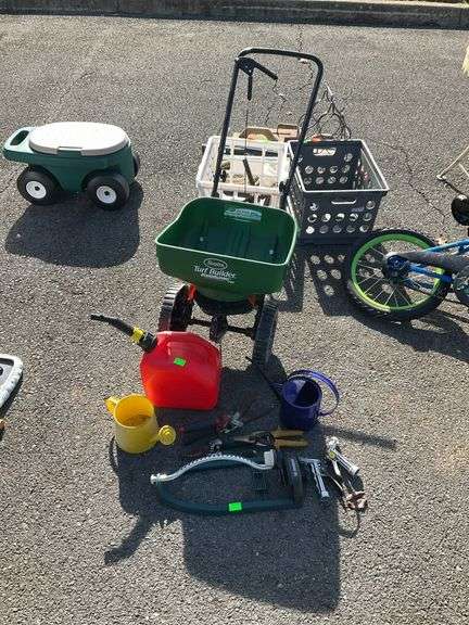Seed/salt spreader, fuel can, watering cans and garden tools