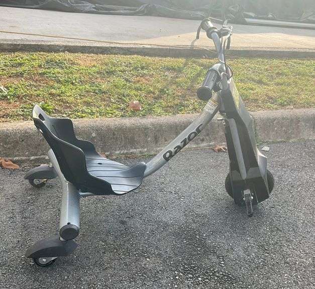 Razor power rider 360, with charger, tested and working, charger has been taped, may need a replacement at some point