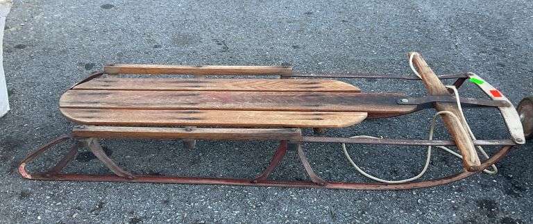 Sleigh, wooden body, metal frame, frame has some rust