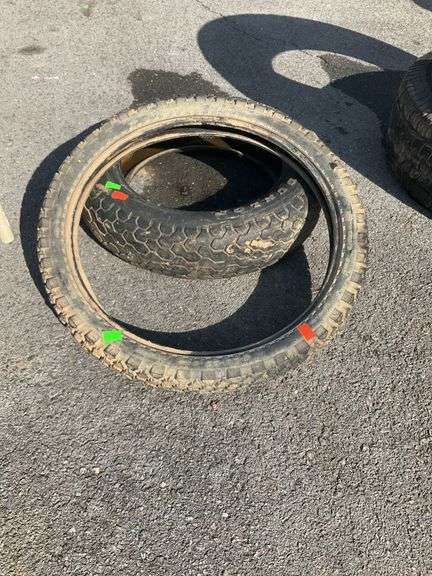 Two motorcycle tires, 3.00-21 and M140/90-16