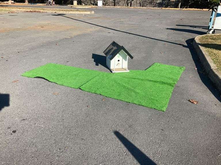 Birdhouse with metal roof and leaf accent, wooden body, 18”H x 18”W x 12”L, and turf