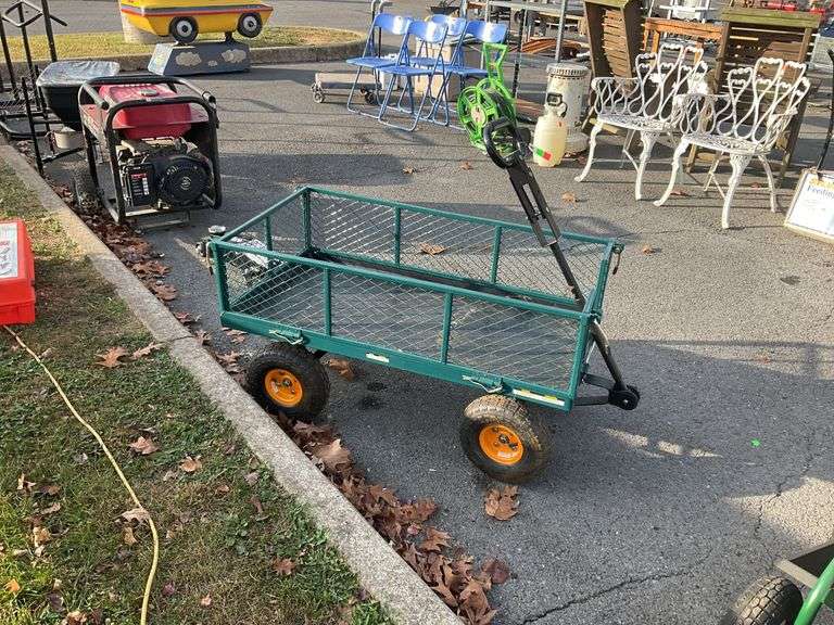 Steel garden cart, mesh frame, all terrain wheels, poly lined floor, 39”L x20”W, back left tire does have a hole but is holding air, at some point will need to be fixed