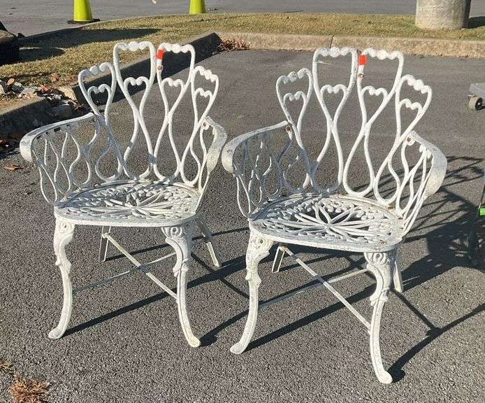 Pair of aluminum garden chairs, Victorian style, both have some paint chipping and rust, but a little TLC could really bring these chairs to life
