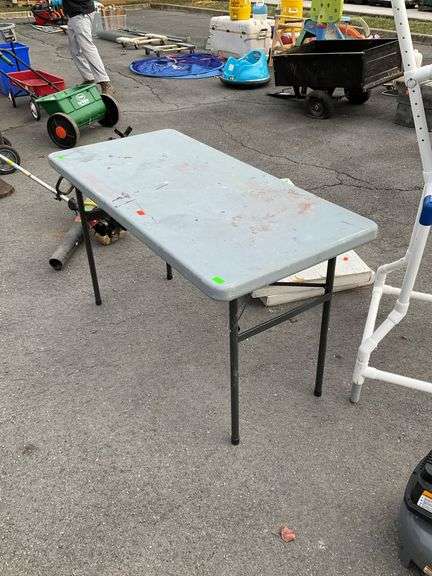 Poly 4-Foot table, painter used.