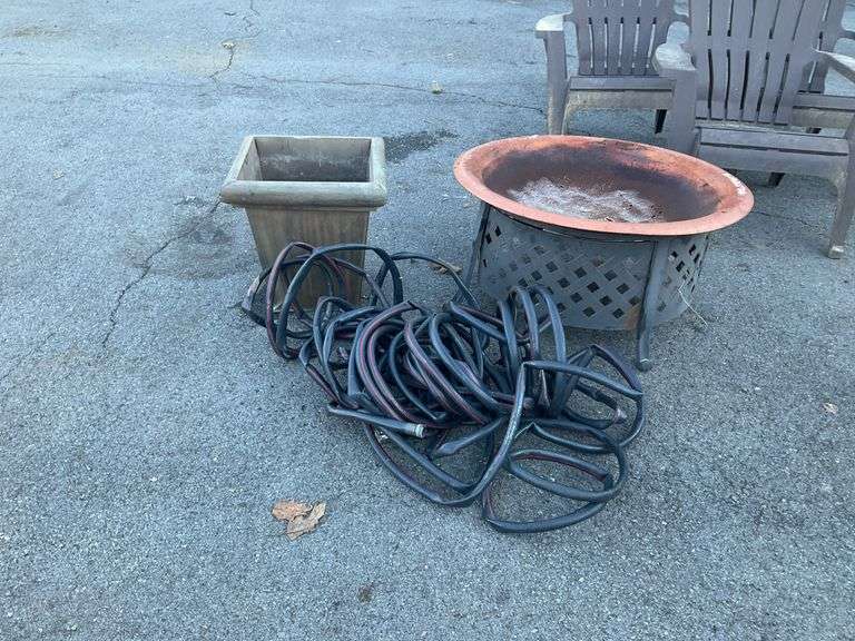 Firepit, metal planter and garden hose, all items have some damage