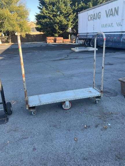 U-cart, diamond plate platform, 5’L, there is rust and wheels have very little to no rubber coating