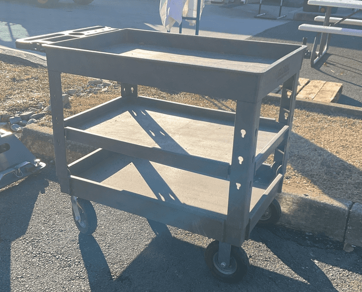 Global three tier poly cart, 3’L x 2’W x 3’H, left side is damaged, tires need air