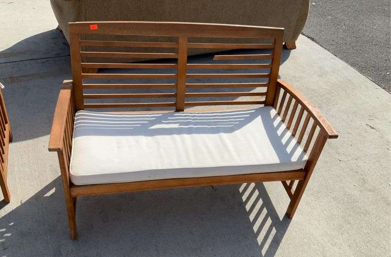 Safavieh wooden bench with cushion, has one piece that’s broken as shown
